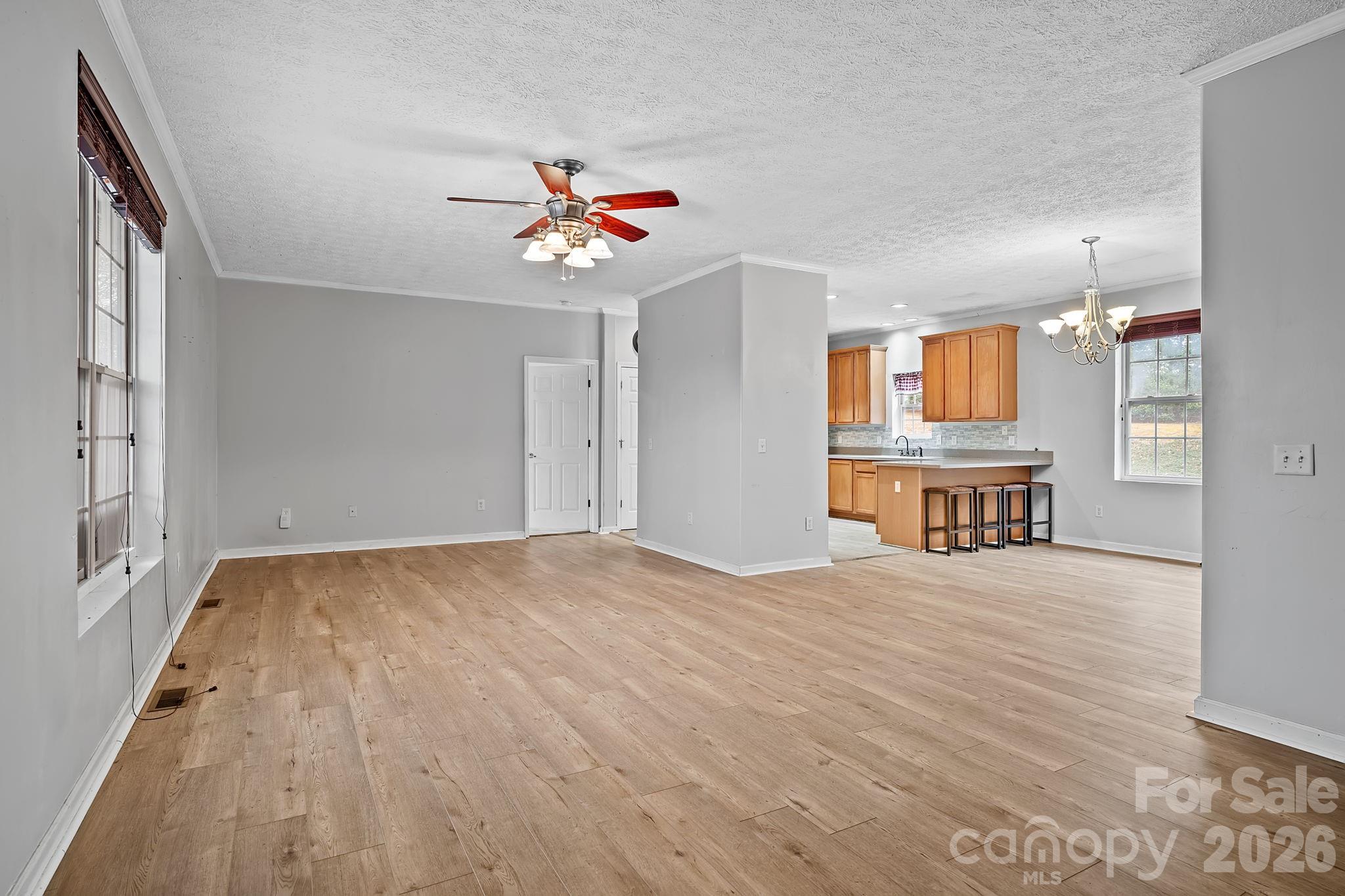 60 Maple Ridge Drive Old Fort, NC 28762 - Photo 6 of 42 wooden floor in an empty room with a window