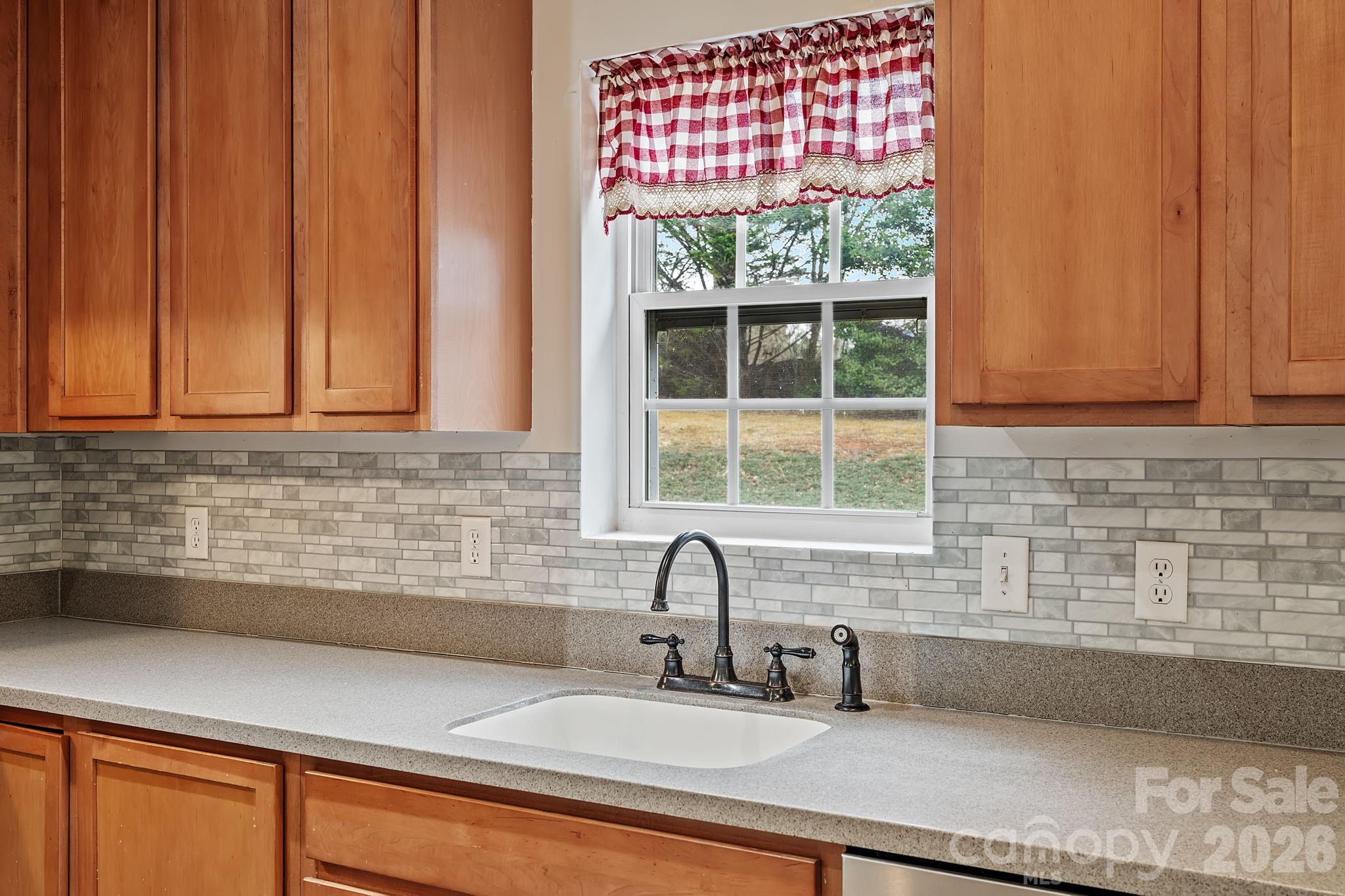 60 Maple Ridge Drive Old Fort, NC 28762 - Photo 10 of 42 a bathroom with a sink and a bathtub