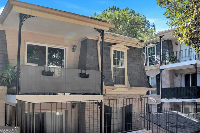 a front view of a house with a porch