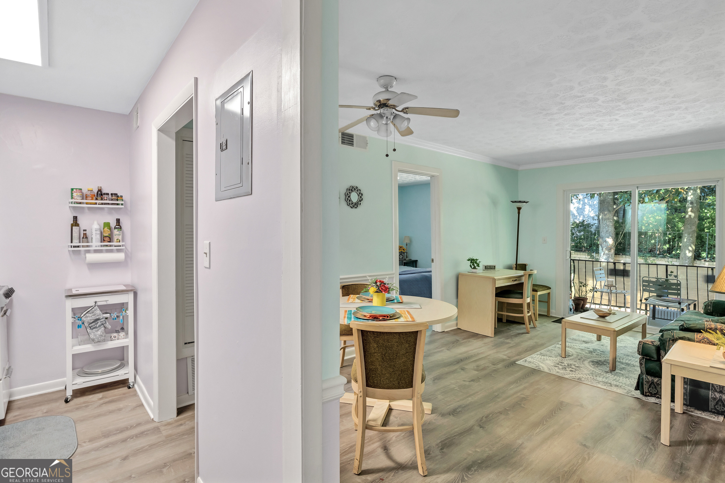 2805 Northeast Expressway Northeast, Unit C12 Atlanta, GA 30345 - Photo 11 of 21 a living room with furniture a rug and white walls