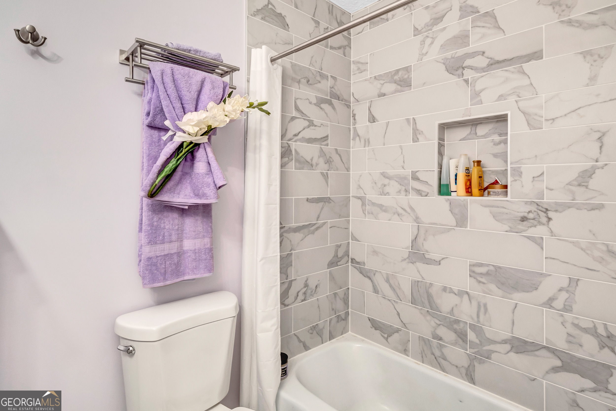 2805 Northeast Expressway Northeast, Unit C12 Atlanta, GA 30345 - Photo 21 of 21 a bathroom with a bathtub and shower