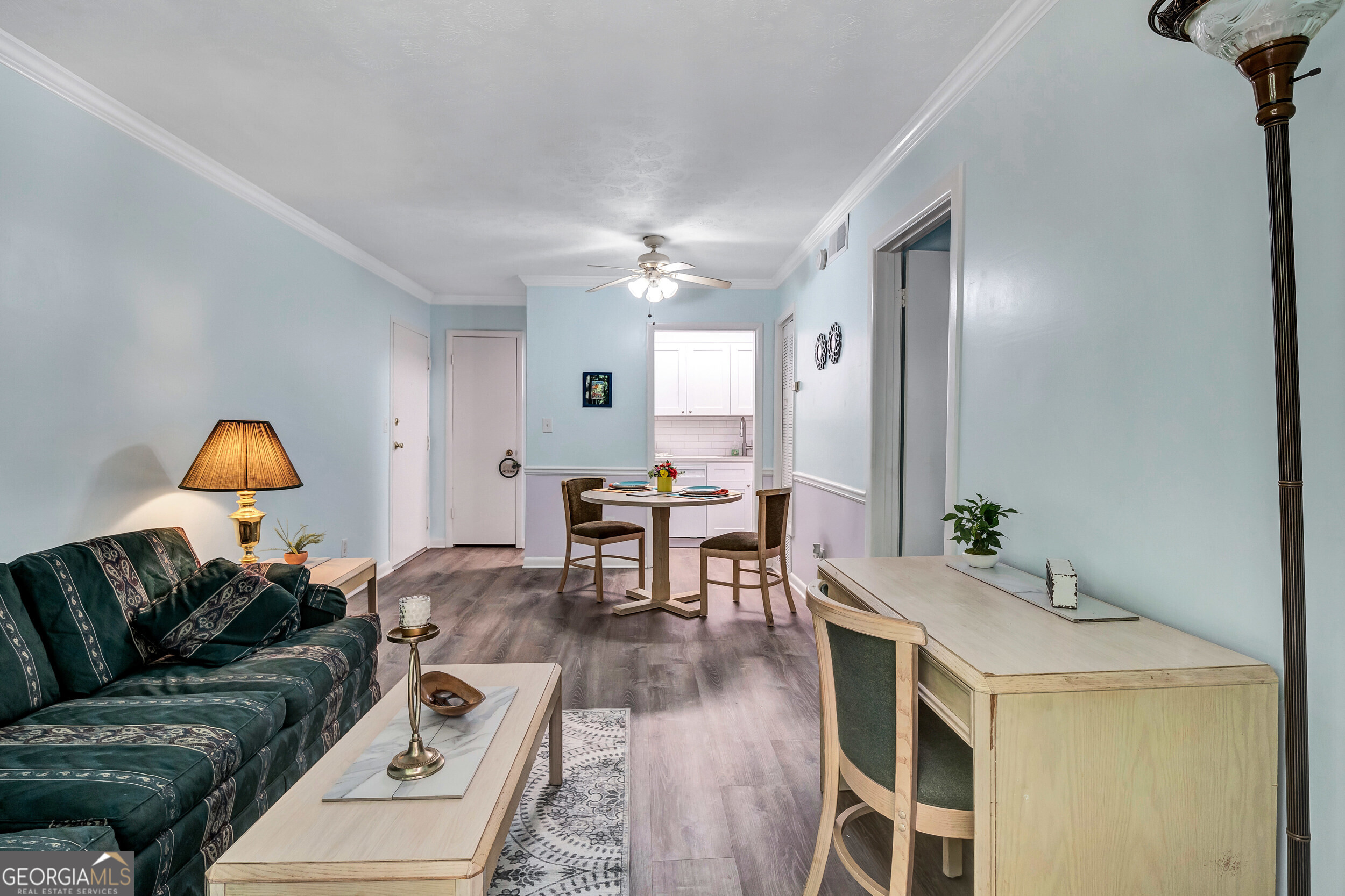 2805 Northeast Expressway Northeast, Unit C12 Atlanta, GA 30345 - Photo 4 of 21 a living room with furniture and a wooden floor