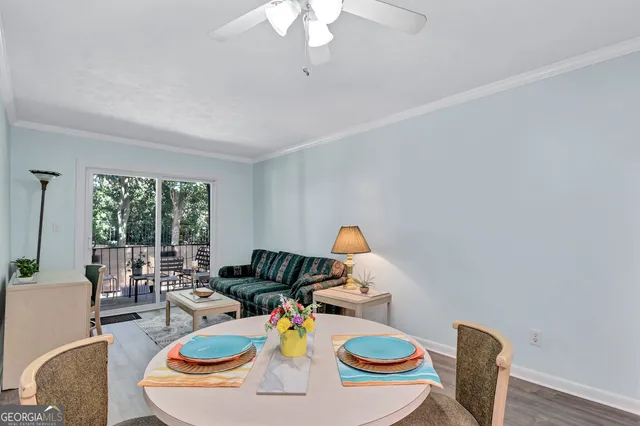 a living room with furniture and a table