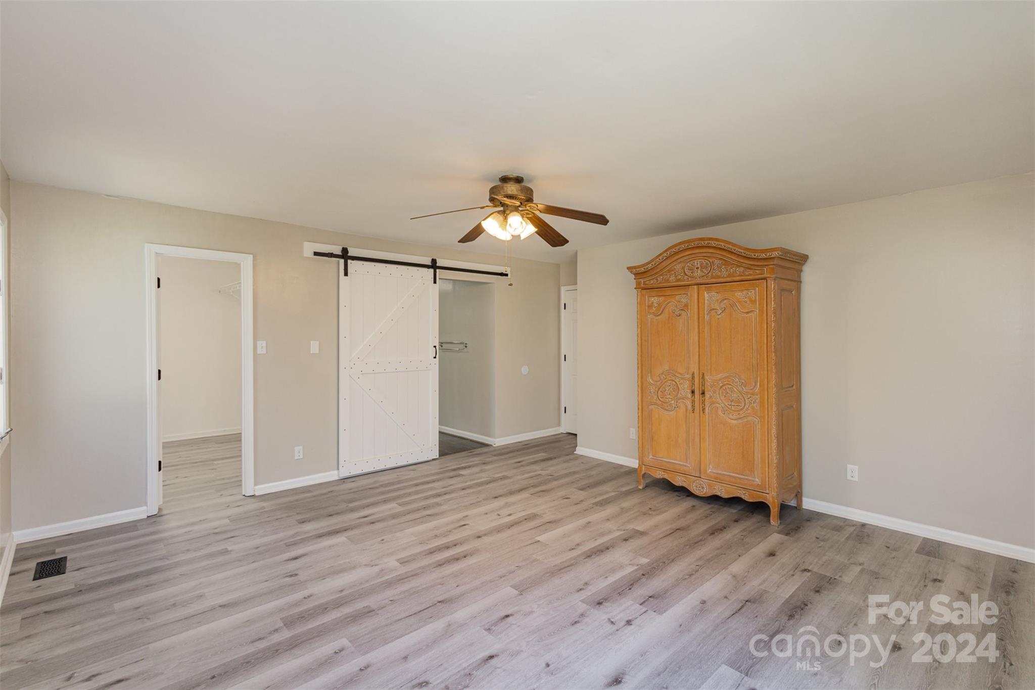 1704 Double Oaks Road Fort Mill, SC 29715 - Photo 20 of 48 a view of empty room with wooden floor