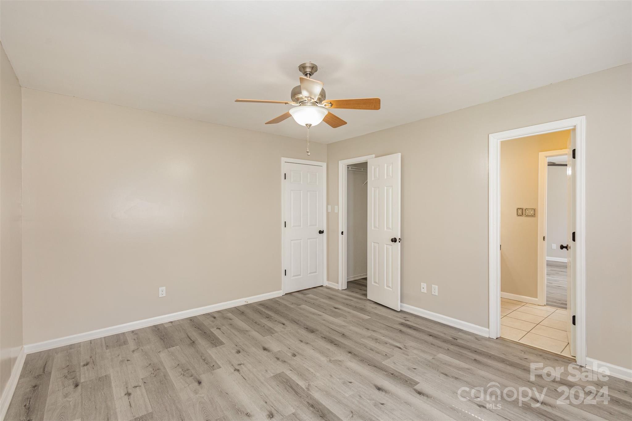1704 Double Oaks Road Fort Mill, SC 29715 - Photo 24 of 48 wooden floor in an empty room