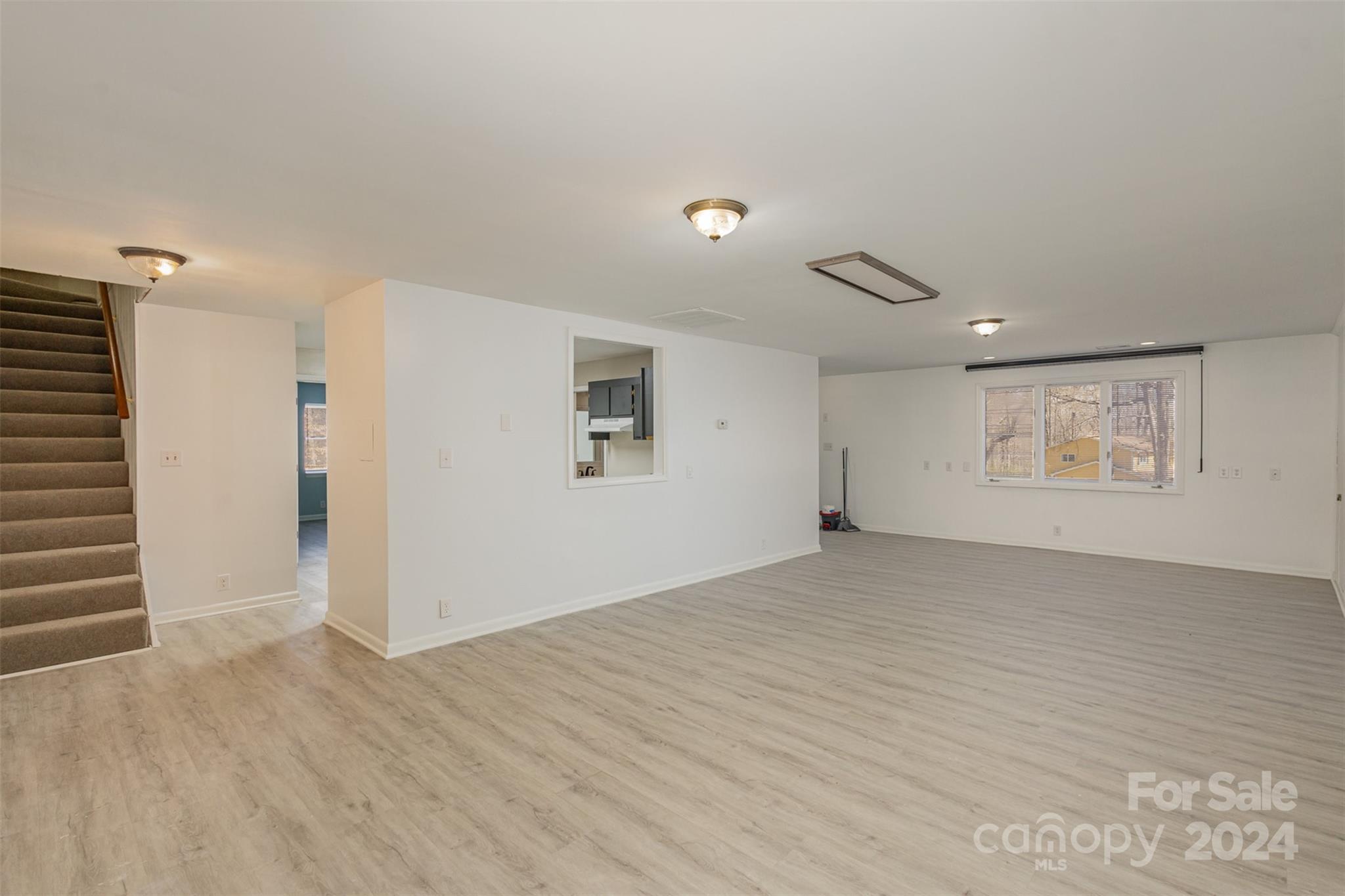 1704 Double Oaks Road Fort Mill, SC 29715 - Photo 30 of 48 a view of an empty room with a window