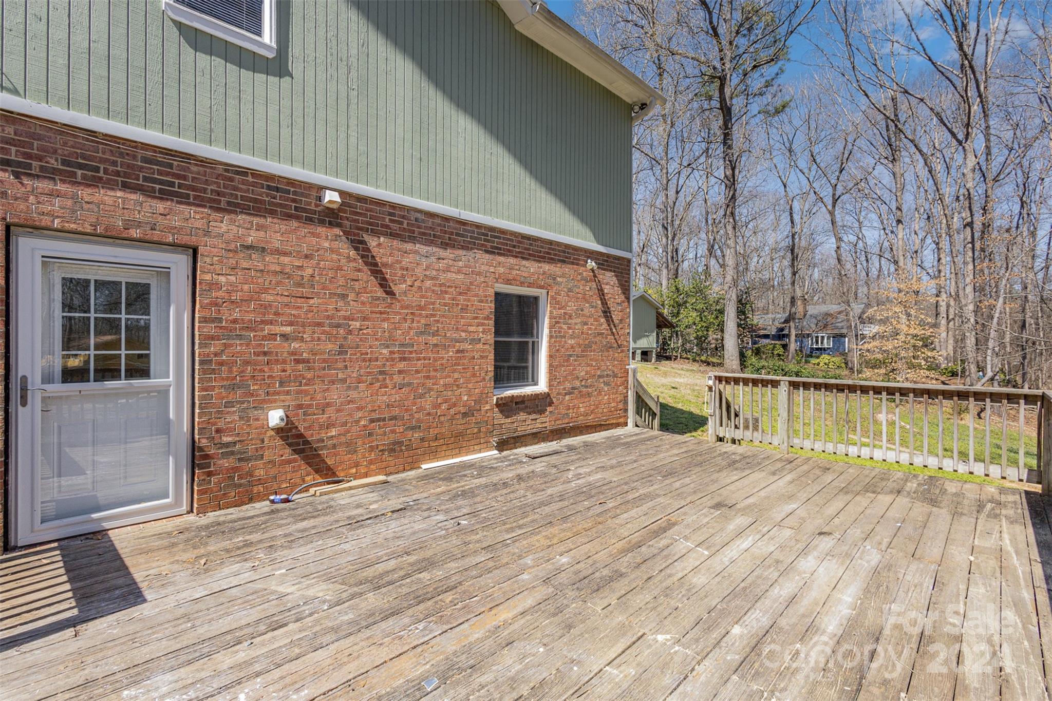 1704 Double Oaks Road Fort Mill, SC 29715 - Photo 45 of 48 a view of a house with wooden deck