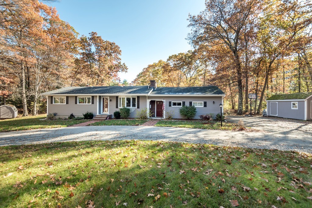 151 Killam Hill Road Boxford, MA 01921 - Photo 1 of 30 a view of a house with a big yard and large trees