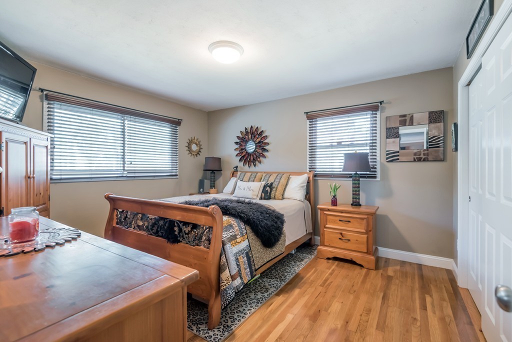 151 Killam Hill Road Boxford, MA 01921 - Photo 12 of 30 a bed room with a bed and a window