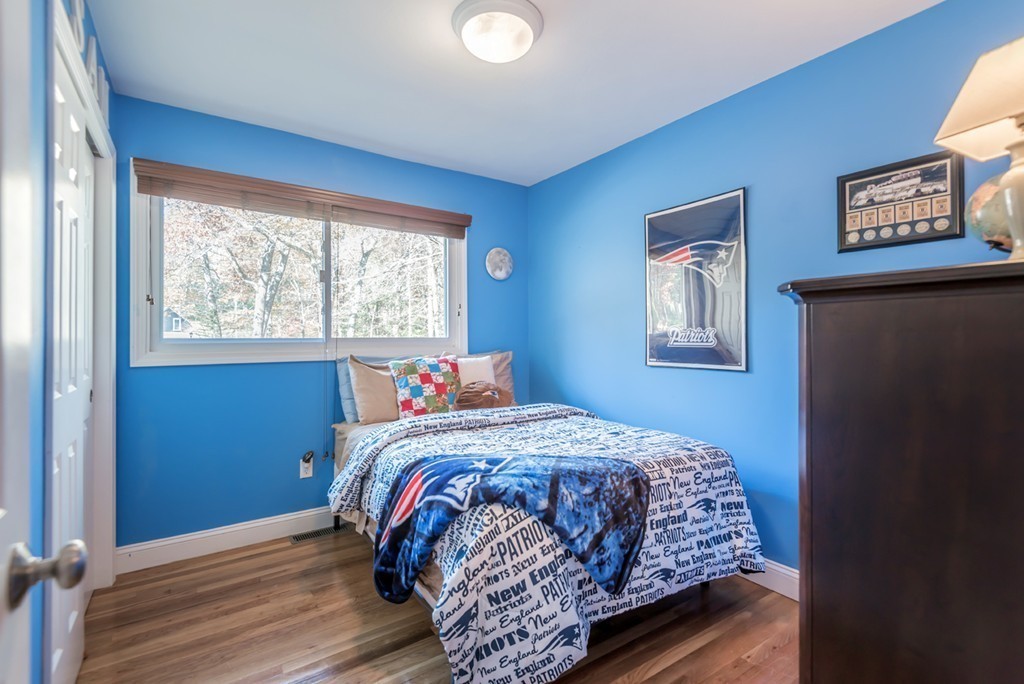 151 Killam Hill Road Boxford, MA 01921 - Photo 14 of 30 a bedroom with bed and a window