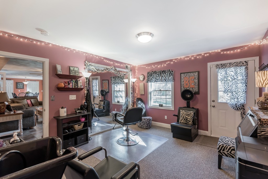 151 Killam Hill Road Boxford, MA 01921 - Photo 15 of 30 a living room with furniture or couch and a flat screen tv
