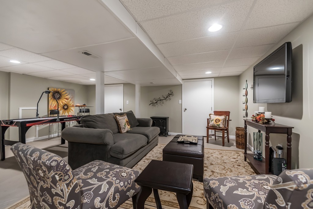 151 Killam Hill Road Boxford, MA 01921 - Photo 17 of 30 a living room with furniture and a flat screen tv