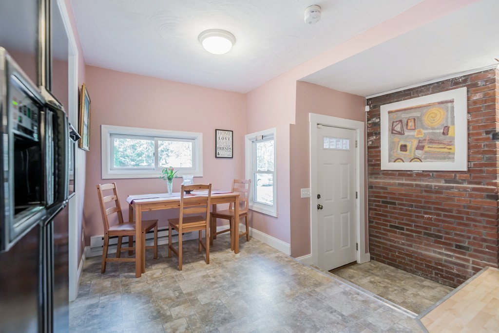 151 Killam Hill Road Boxford, MA 01921 - Photo 24 of 30 a view of a livingroom with furniture and a flat screen tv