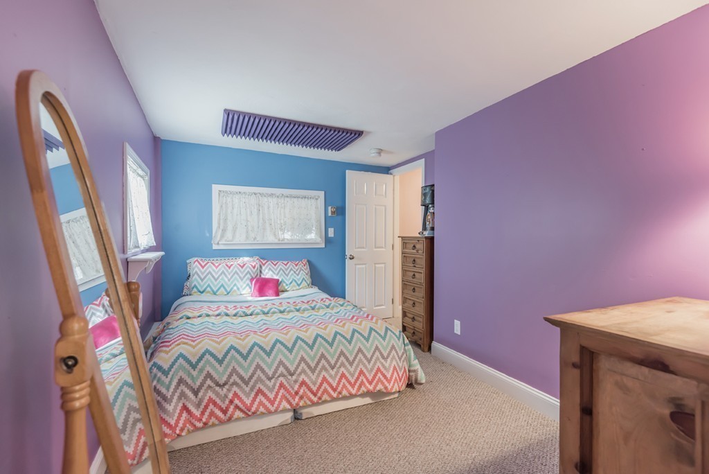 151 Killam Hill Road Boxford, MA 01921 - Photo 25 of 30 a bedroom with a bed and a dresser