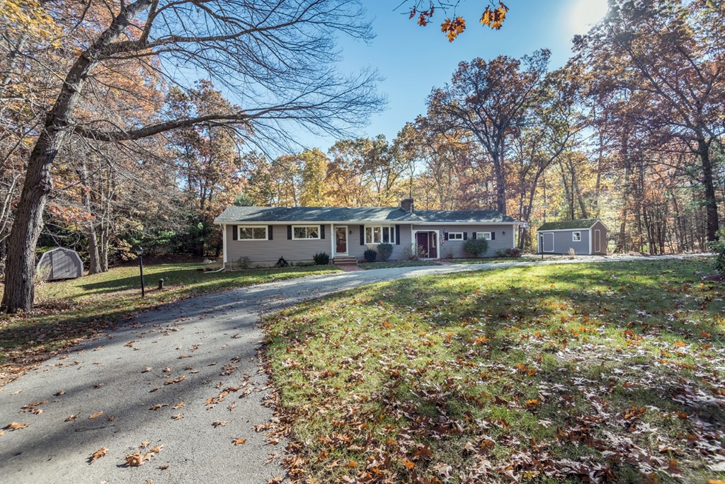 151 Killam Hill Road Boxford, MA 01921 - Photo 30 of 30 a front view of a house with a yard