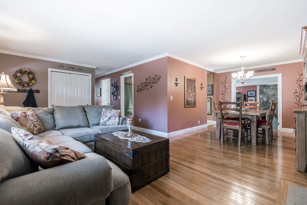 151 Killam Hill Road Boxford, MA 01921 - Photo 3 of 30 a living room with furniture wooden floor and a window