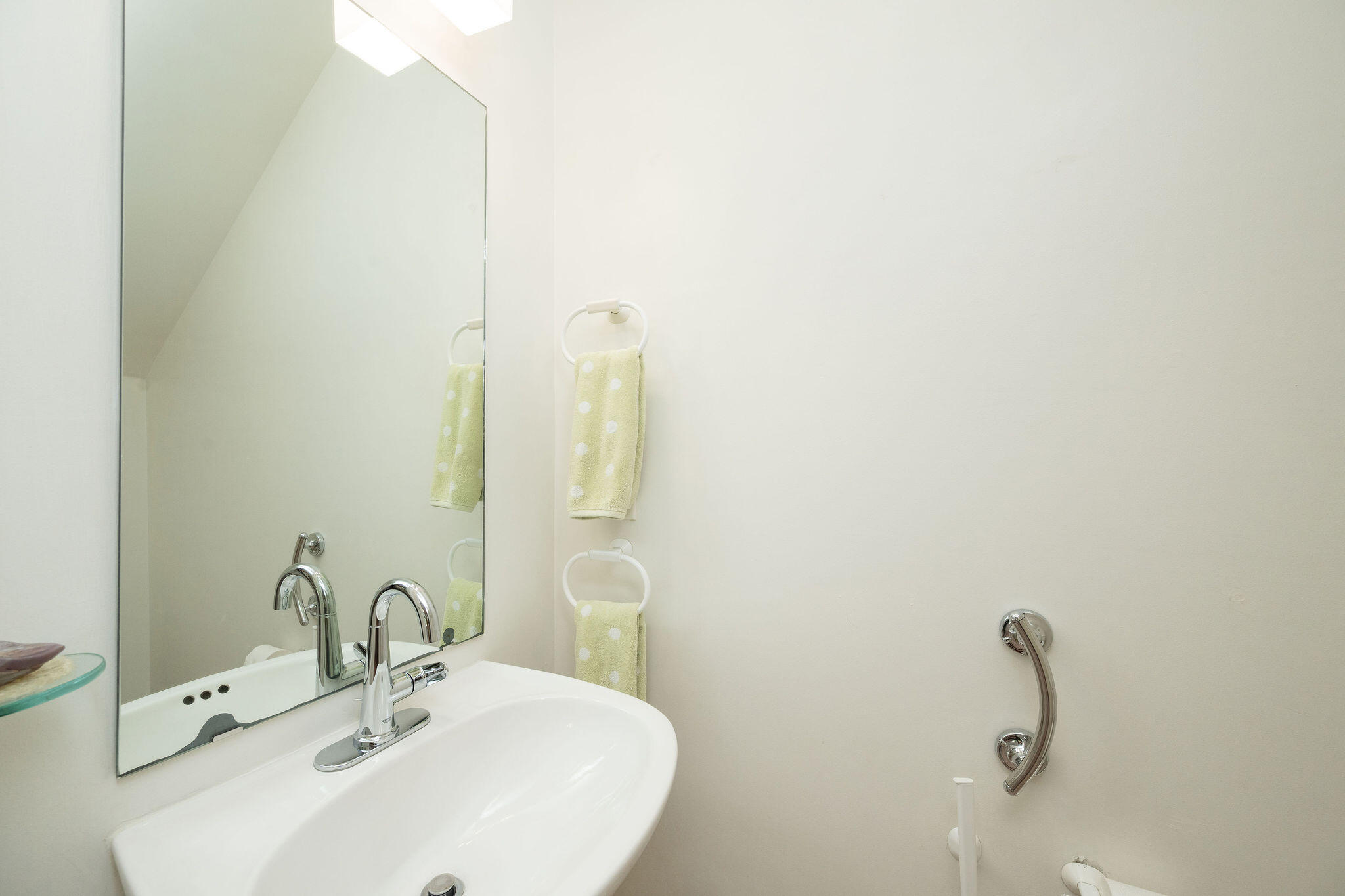 1 Spoonbill Way Key West, FL 33040 - Photo 16 of 38 a bathroom with a sink and mirror