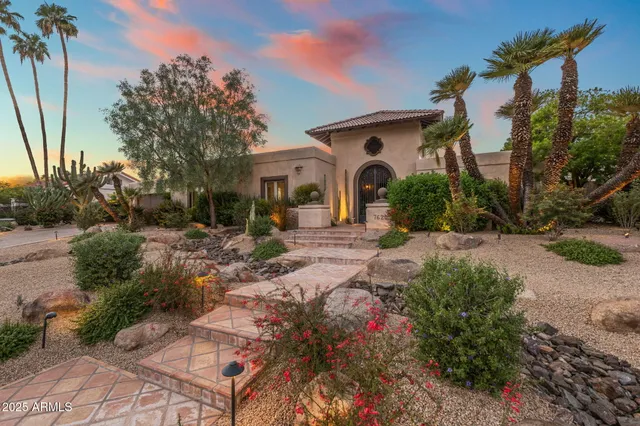 a view of a lake with sitting area