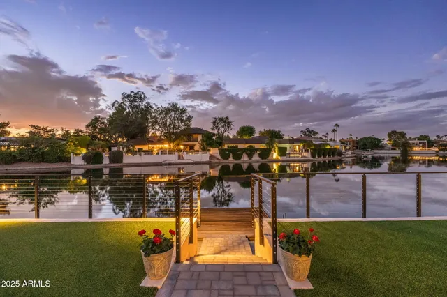 a aerial view of a house with garden space and street view