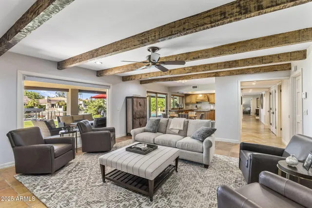 a bathroom with a toilet a sink and a mirror