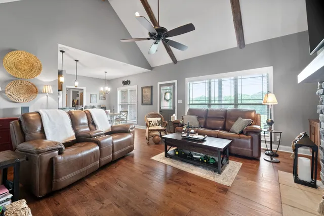 a view of a swimming pool and a yard