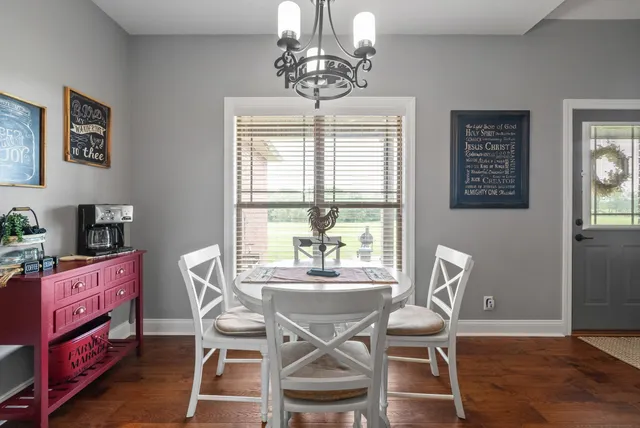 a workspace with furniture and a window