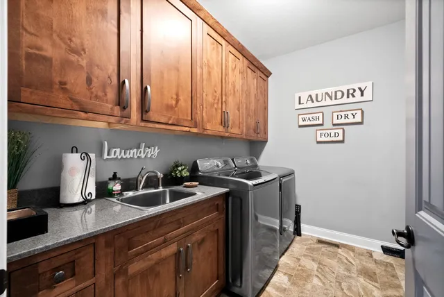 a work room with furniture and a window