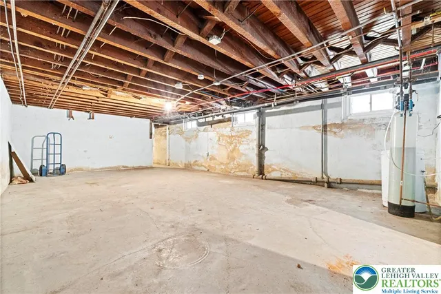 aerial view of a house with a yard