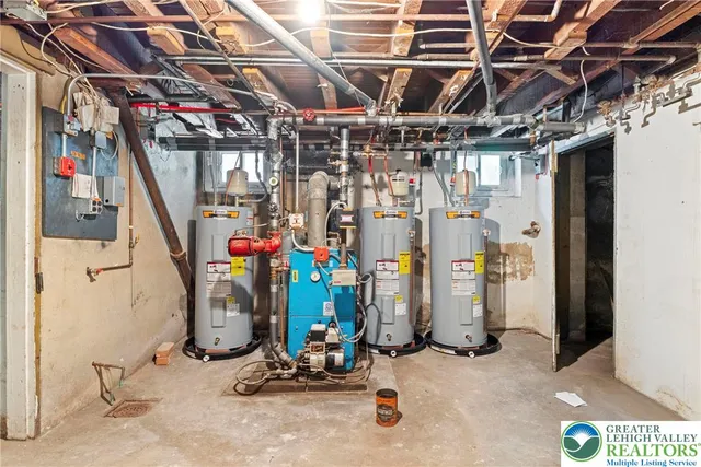 an aerial view of residential house with outdoor space and swimming pool