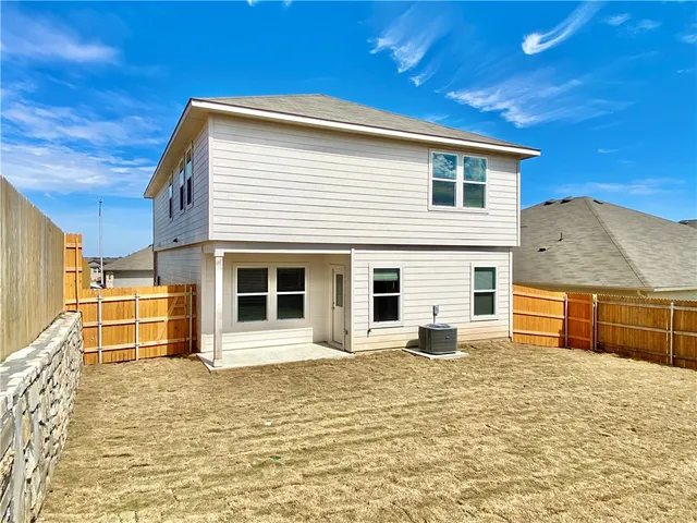a view of an ocean & house