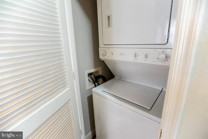 616 E Street Northwest, Unit 655 Washington, DC 20004 - Photo 15 of 38 a utility room with dryer and washer