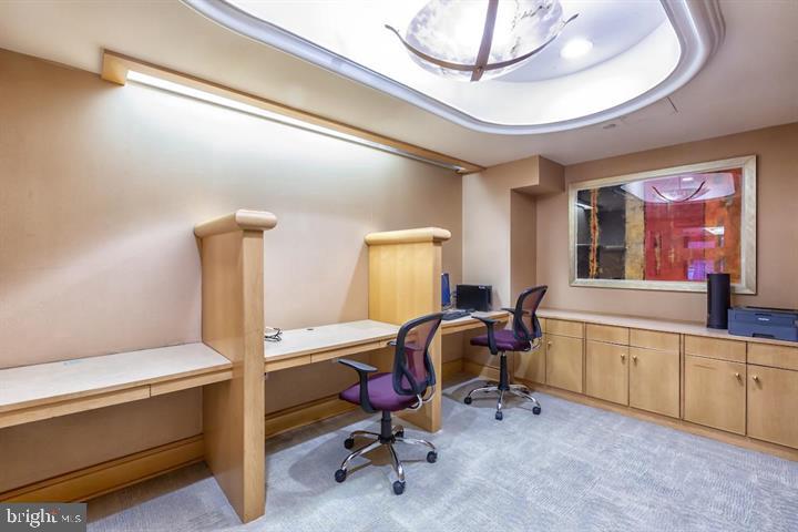 616 E Street Northwest, Unit 655 Washington, DC 20004 - Photo 36 of 38 a view of a workspace with furniture