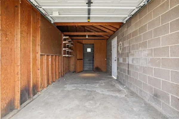 a front view of a house with a garage