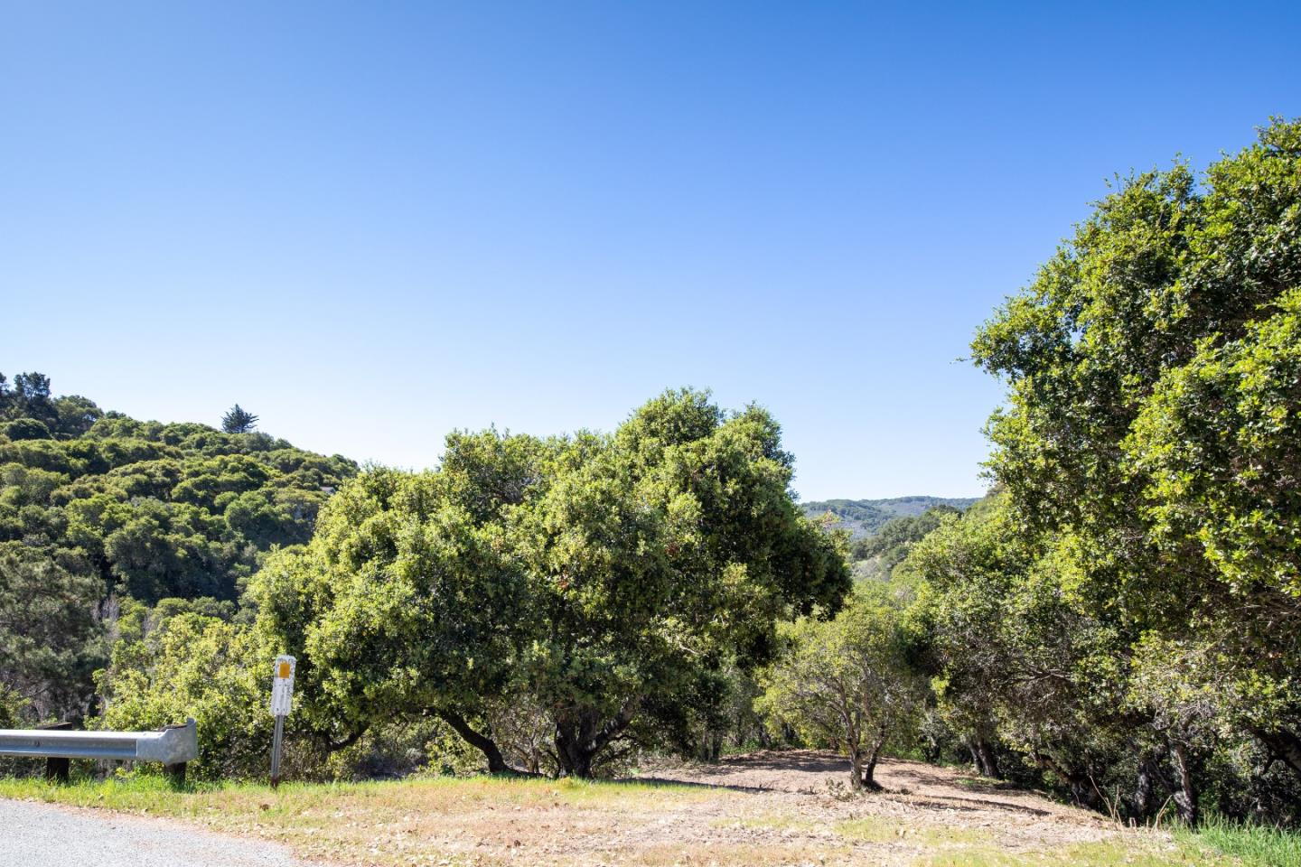28007 Mercurio Road Carmel, CA 93923 - Photo 12 of 21 a view of a swimming pool with an outdoor space and seating area