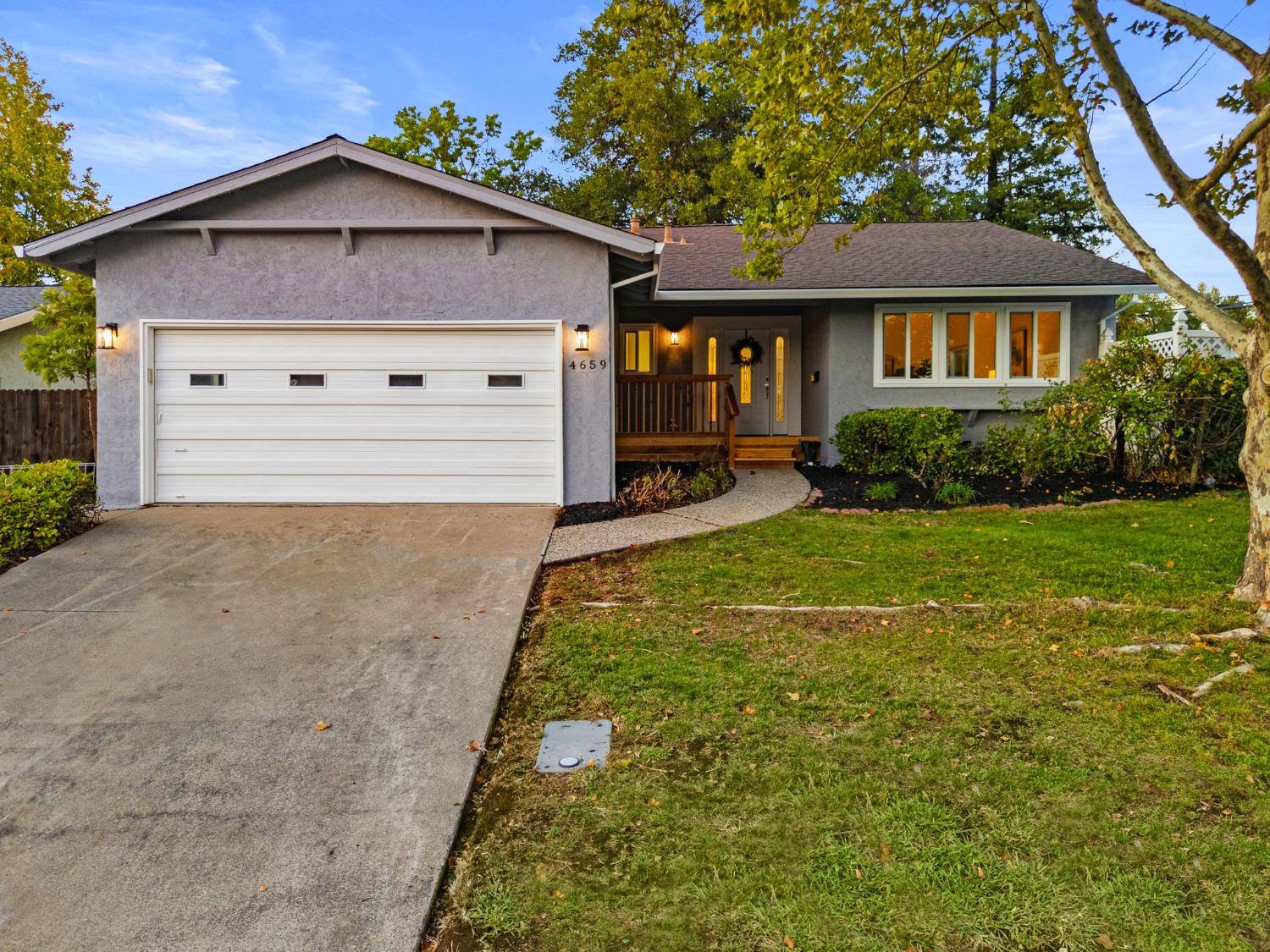 a view of house with garden