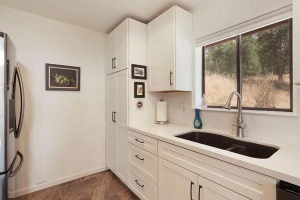 a view of bathroom with dual sinks