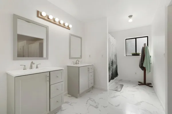 a room that has a bed and gym equipment