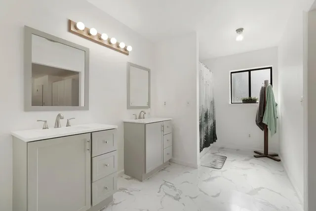 a room that has a bed and gym equipment