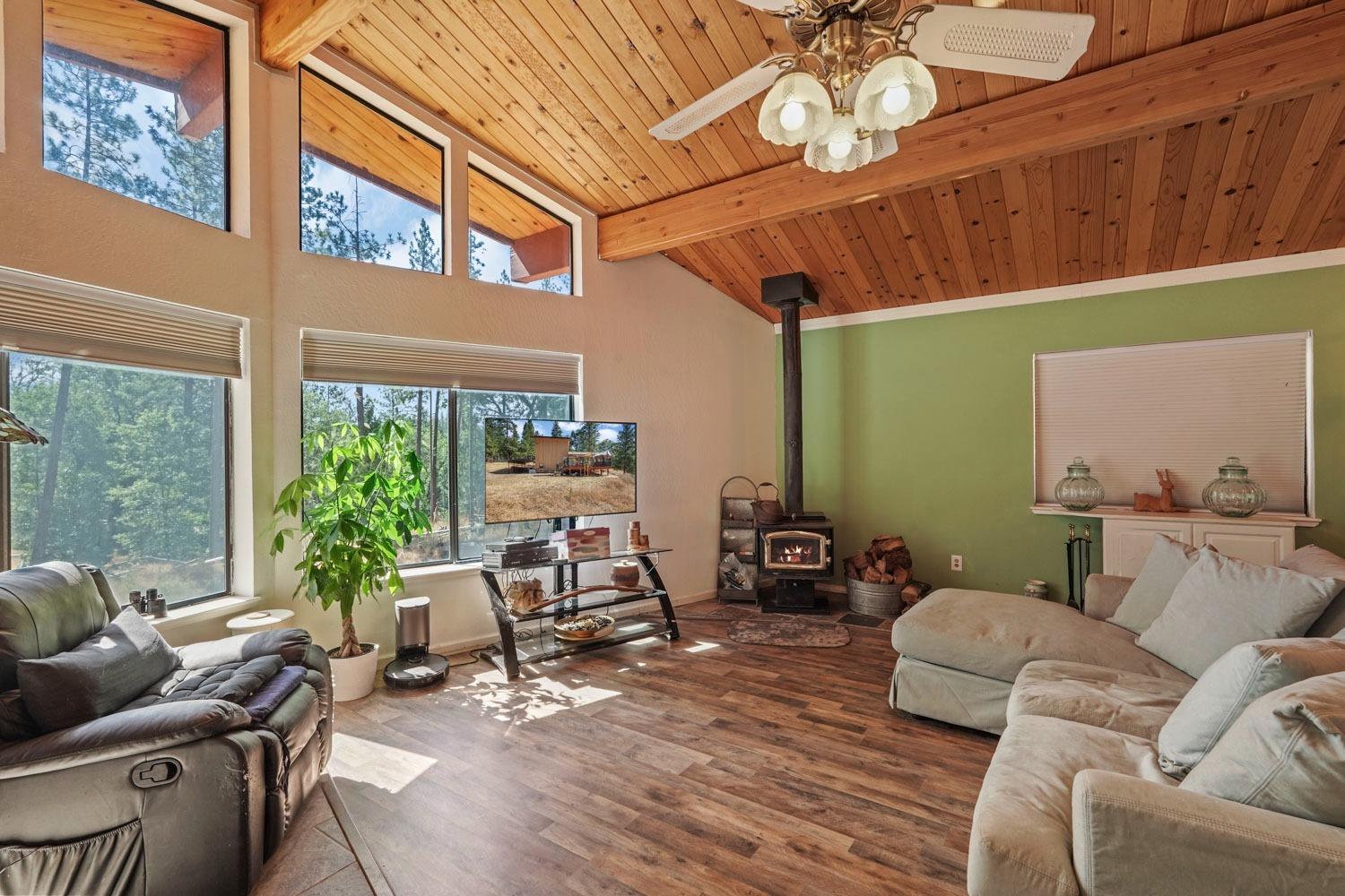 402 Rabbit's Foot Road West Point, CA 95255 - Photo 2 of 65 a living room with furniture and a large window
