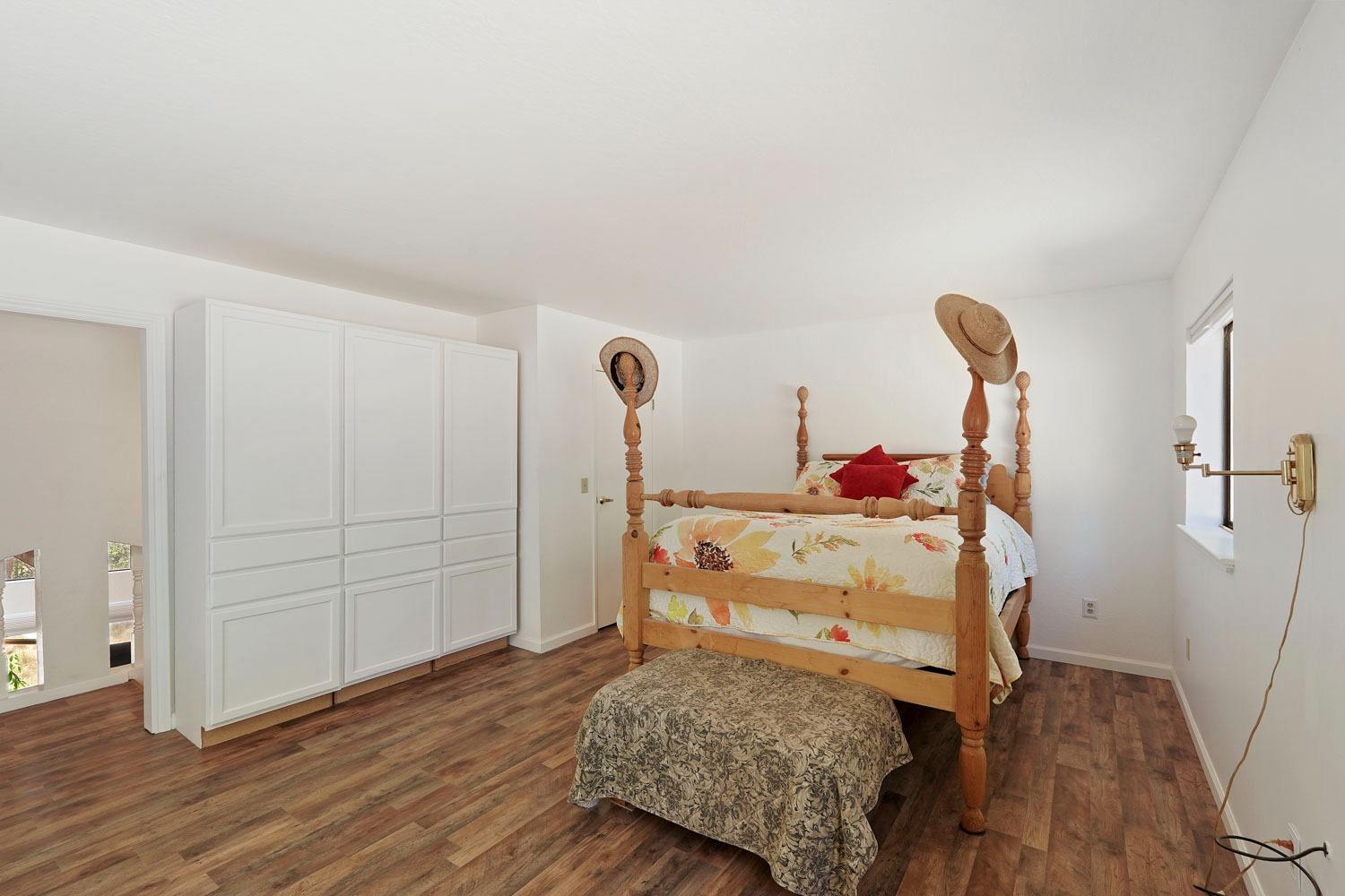 402 Rabbit's Foot Road West Point, CA 95255 - Photo 21 of 65 a room that has a bed and gym equipment