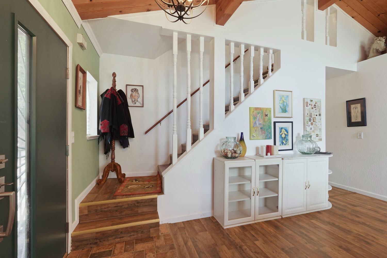 402 Rabbit's Foot Road West Point, CA 95255 - Photo 22 of 65 a view of entryway and hall with wooden floor