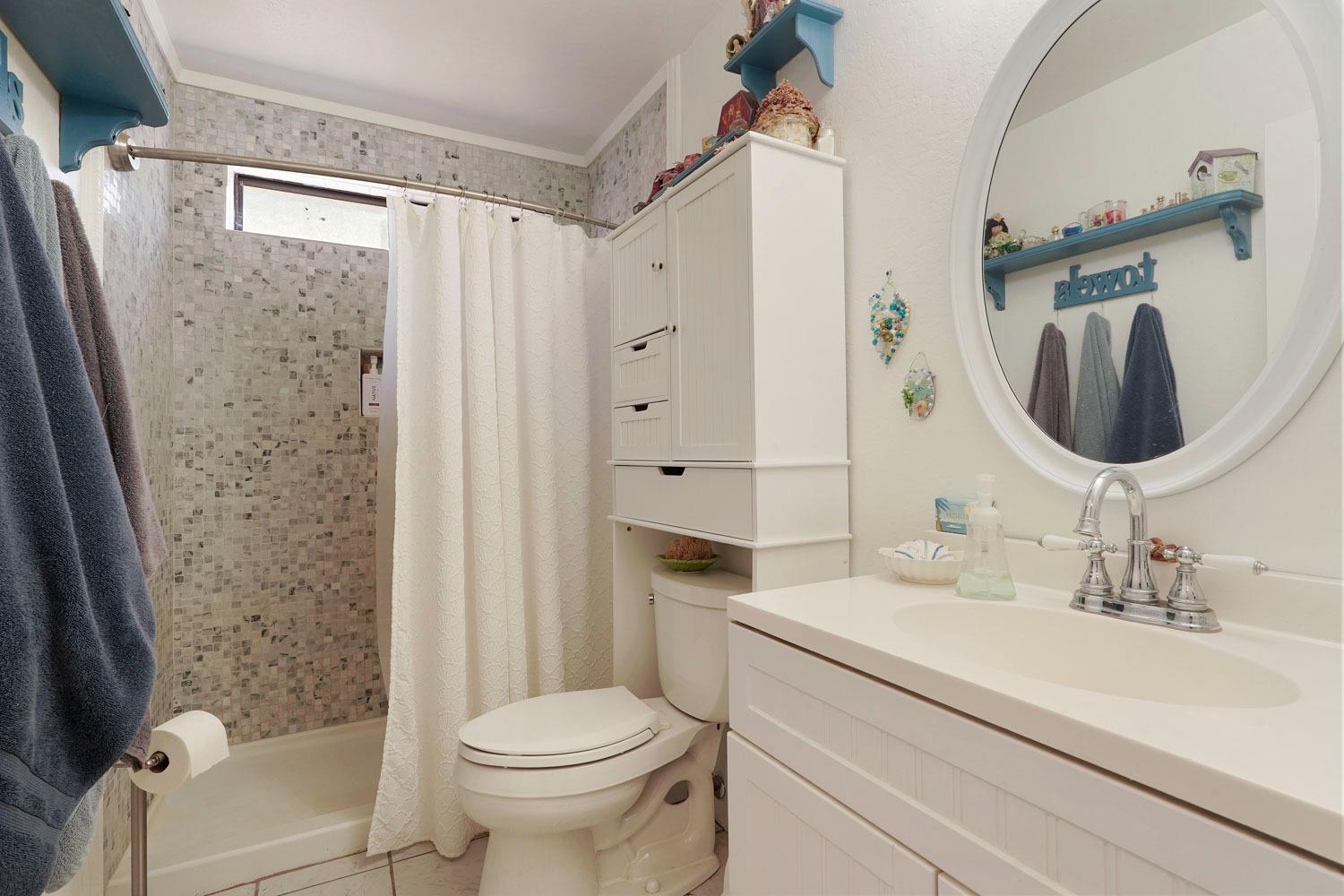 402 Rabbit's Foot Road West Point, CA 95255 - Photo 27 of 65 a bathroom with a sink a toilet and shower