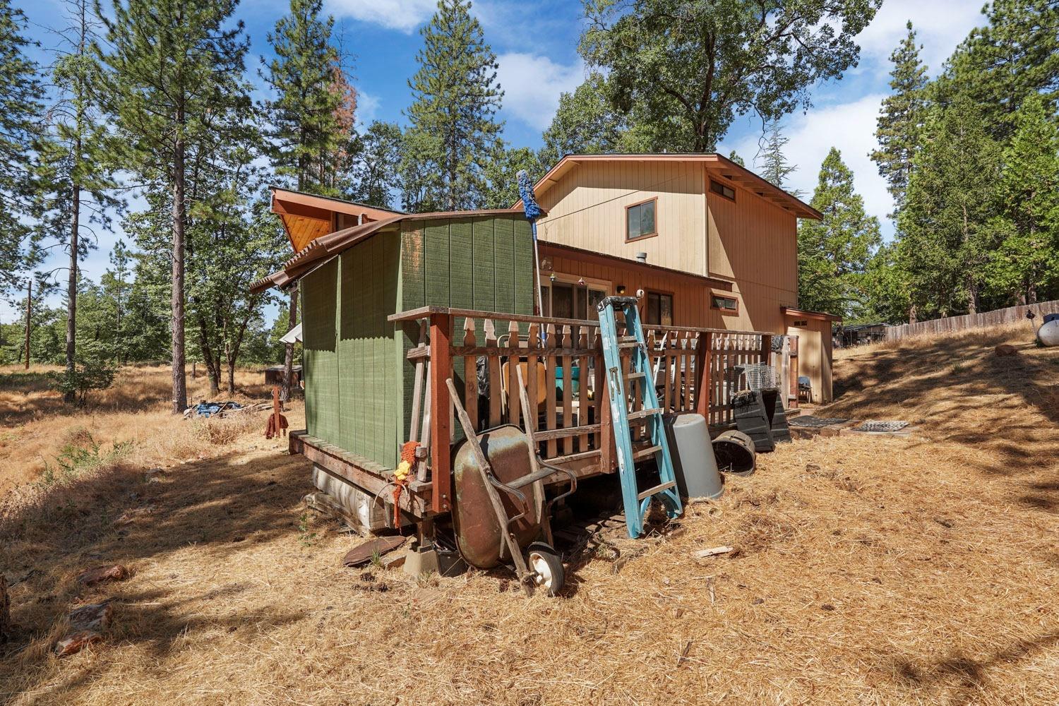 402 Rabbit's Foot Road West Point, CA 95255 - Photo 63 of 65 a view of a wooden house with a snow on the road