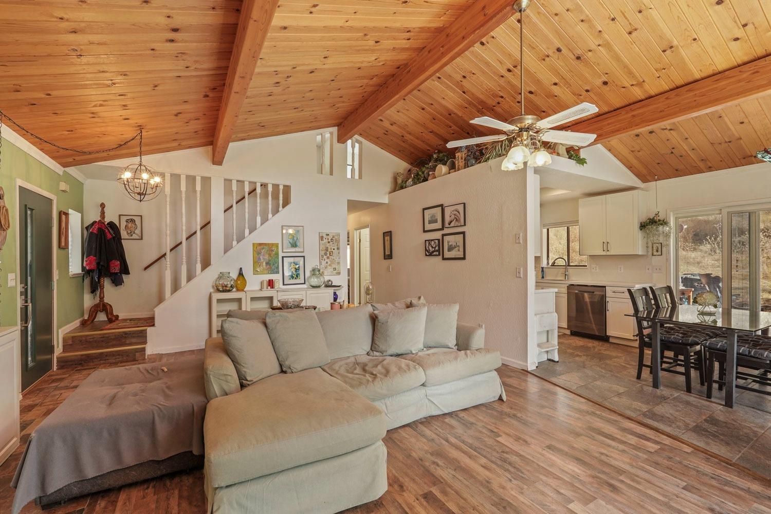 402 Rabbit's Foot Road West Point, CA 95255 - Photo 9 of 65 a living room with furniture and a chandelier