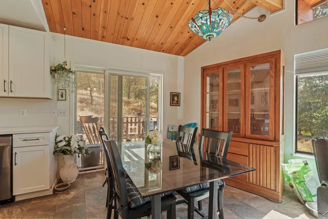 a kitchen with stainless steel appliances a refrigerator stove microwave and sink