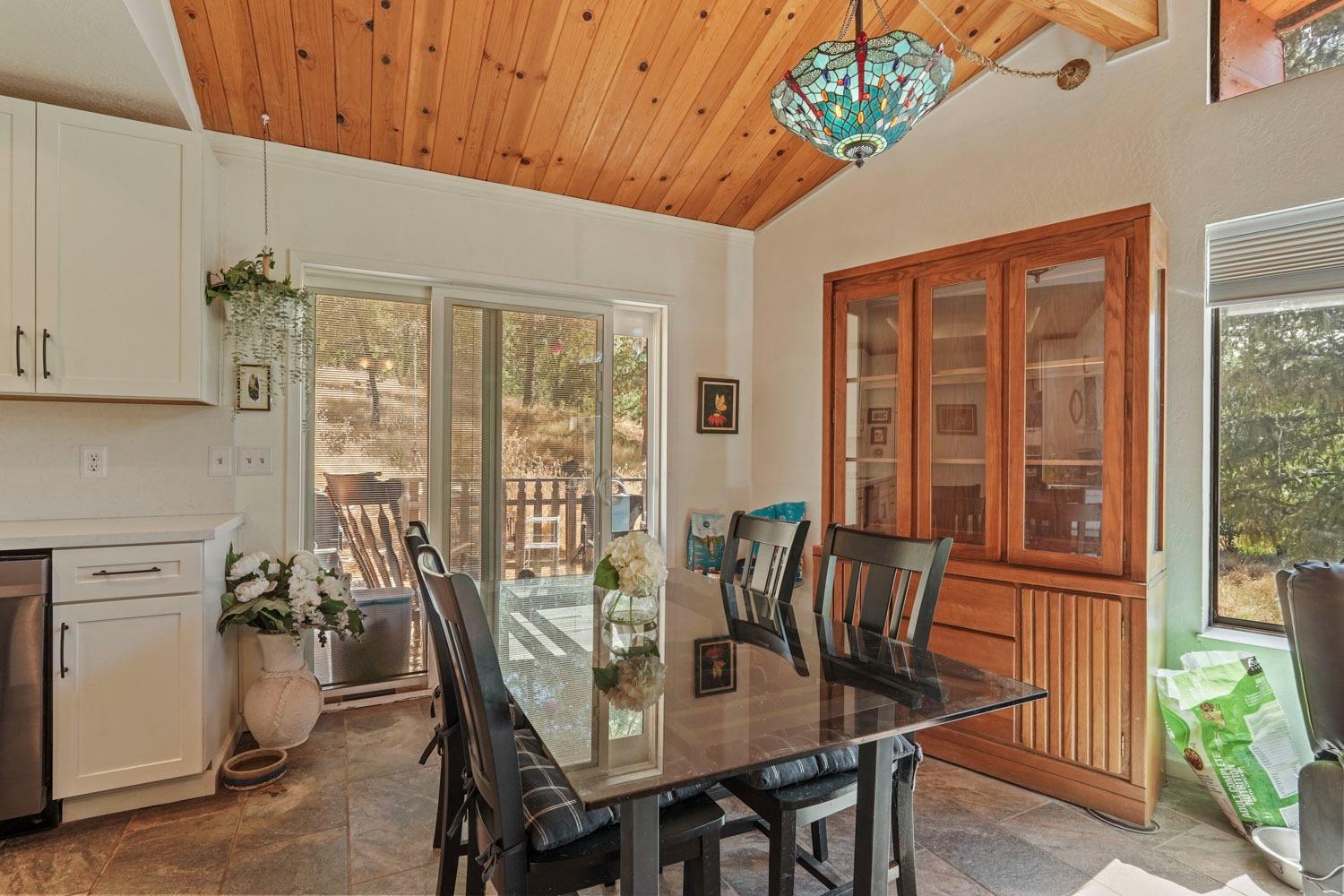 402 Rabbit's Foot Road West Point, CA 95255 - Photo 10 of 65 a view of a dining room with furniture window and outside view
