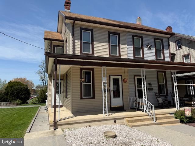411 East Chestnut Street Lebanon, PA 17042 - Photo 1 of 48 a front view of a house with a porch