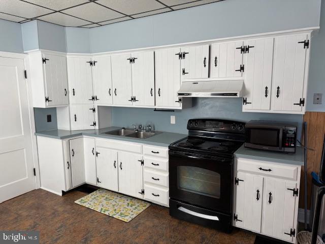 411 East Chestnut Street Lebanon, PA 17042 - Photo 12 of 48 a kitchen with granite countertop white cabinets and stainless steel appliances