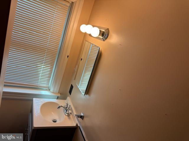 411 East Chestnut Street Lebanon, PA 17042 - Photo 19 of 48 a bathroom with a sink and a mirror