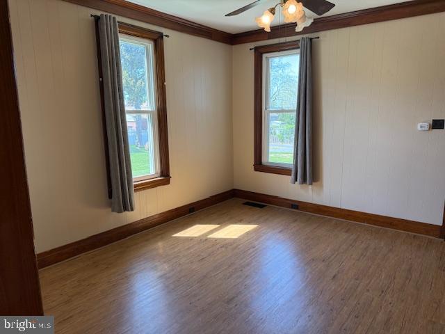 411 East Chestnut Street Lebanon, PA 17042 - Photo 27 of 48 an empty room with wooden floor and windows